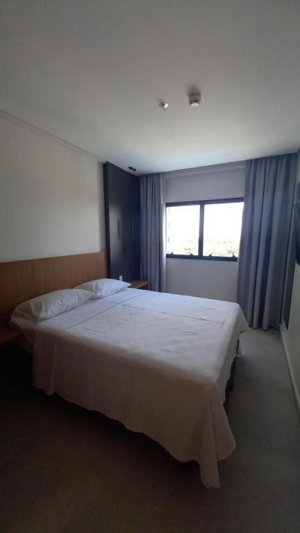 Postel nebo postele na pokoji v ubytování Salinas Premium Resort