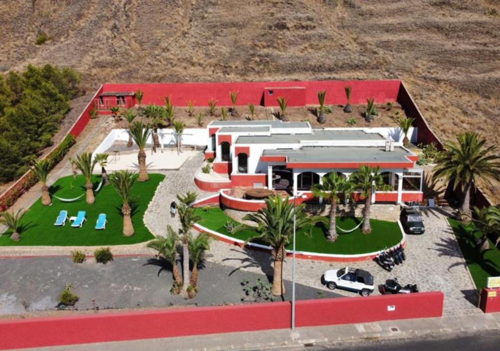 an aerial view of a house with palm trees at Porto Santo Destination in Porto Santo