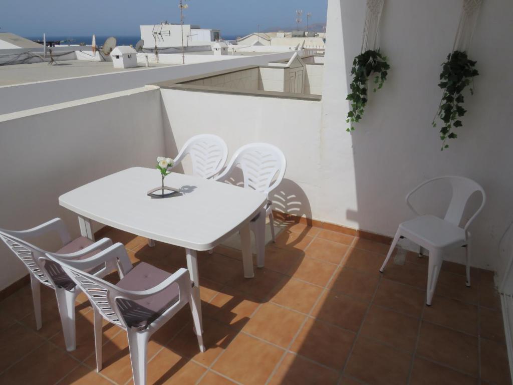 A balcony or terrace at Biósfera Modern Bright Old Town Two Bedroom Apartment PDC