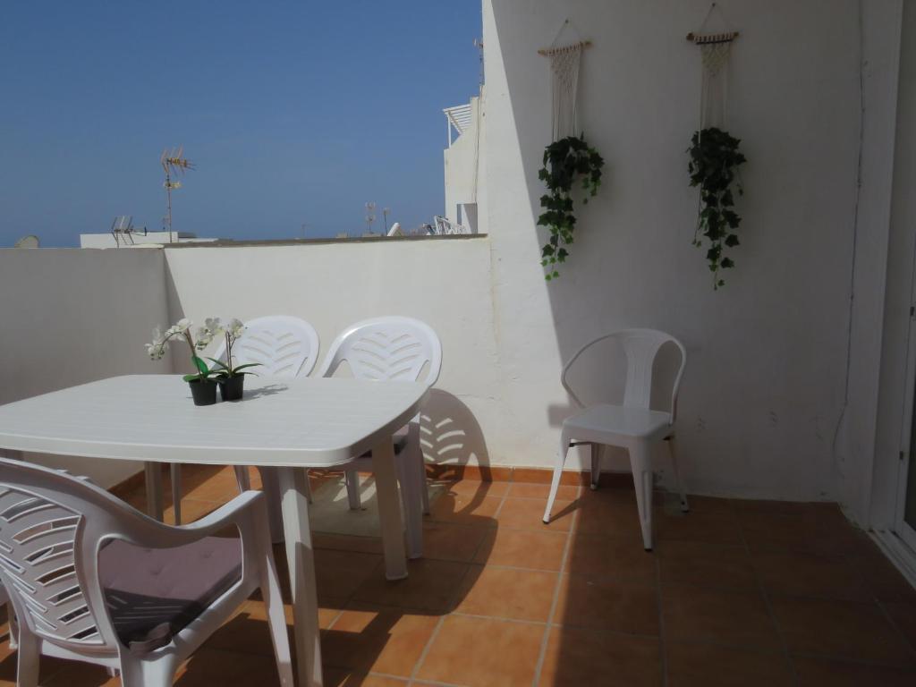 A balcony or terrace at Biósfera Modern Bright Old Town Two Bedroom Apartment PDC