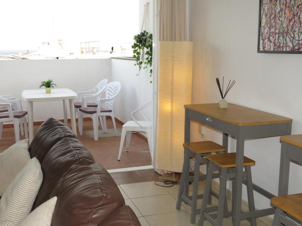 A seating area at Biósfera Modern Bright Old Town Two Bedroom Apartment PDC