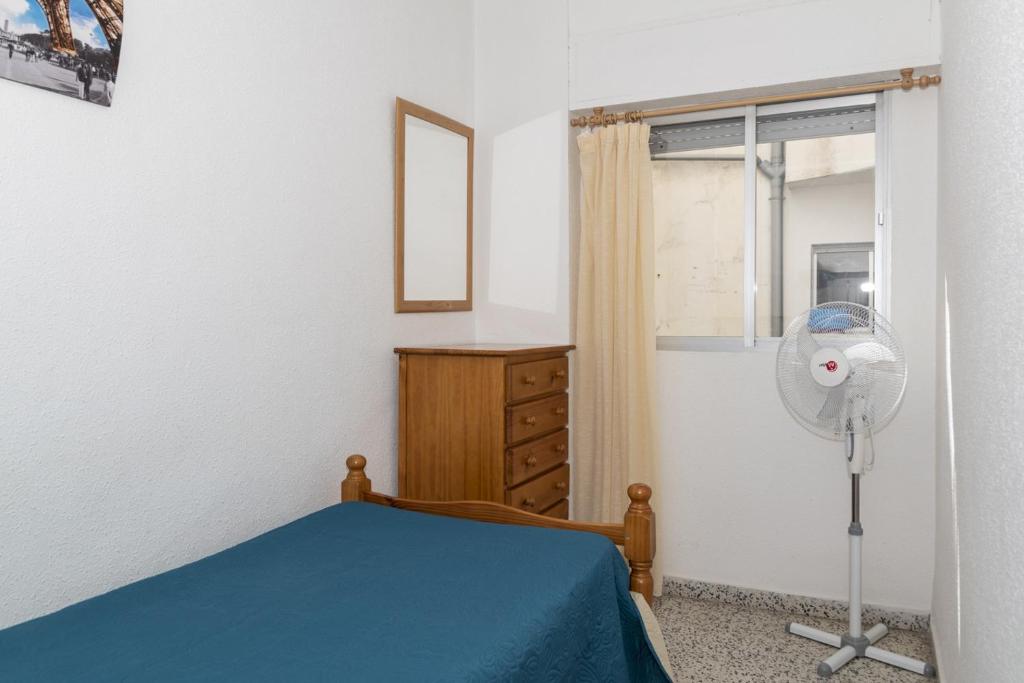 A bed or beds in a room at Miralmar, 10º-69