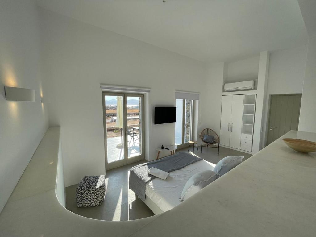 Postel nebo postele na pokoji v ubytování CAMPO SUITES