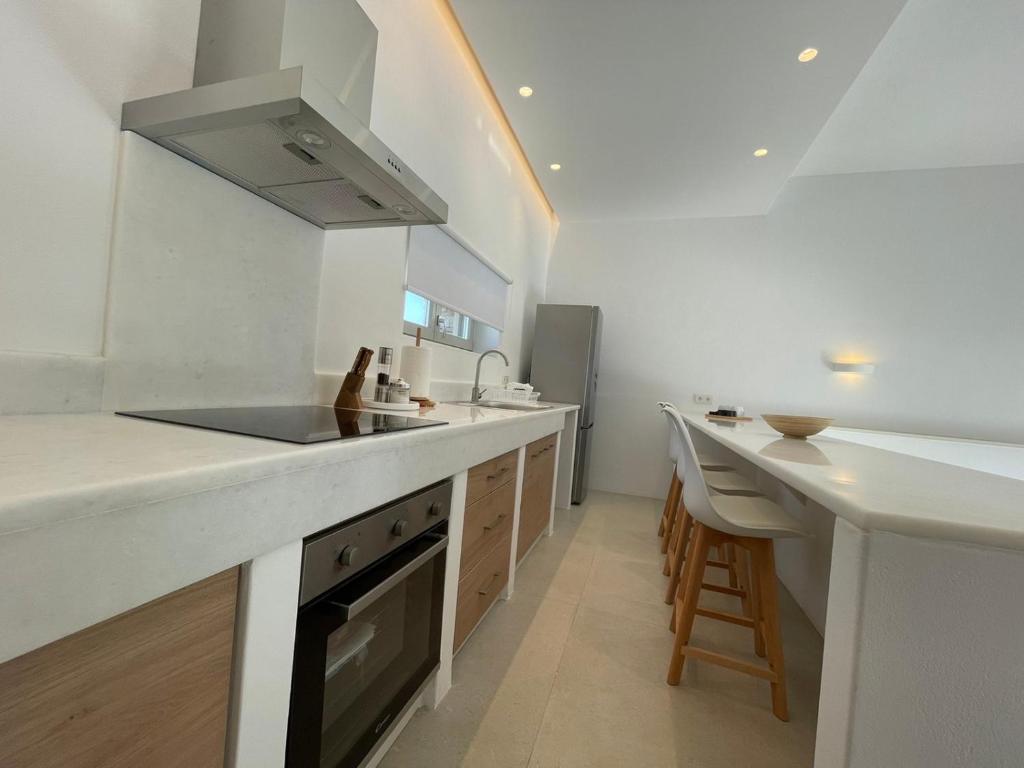 Kuchyň nebo kuchyňský kout v ubytování CAMPO SUITES