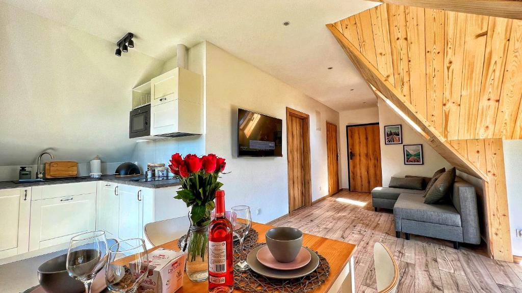Kuchyňa alebo kuchynka v ubytovaní Apartamenty Widok Tatr