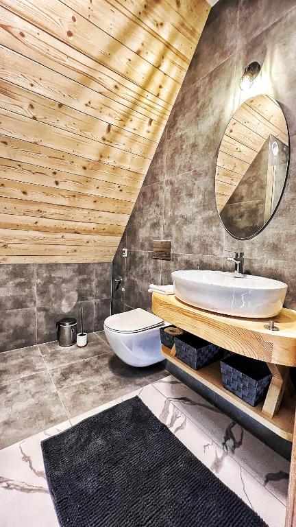 Kúpeľňa v ubytovaní Apartamenty Widok Tatr