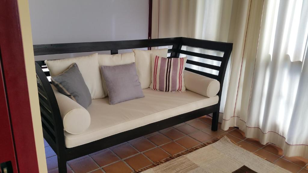 A bed or beds in a room at A CASA DO BUXO