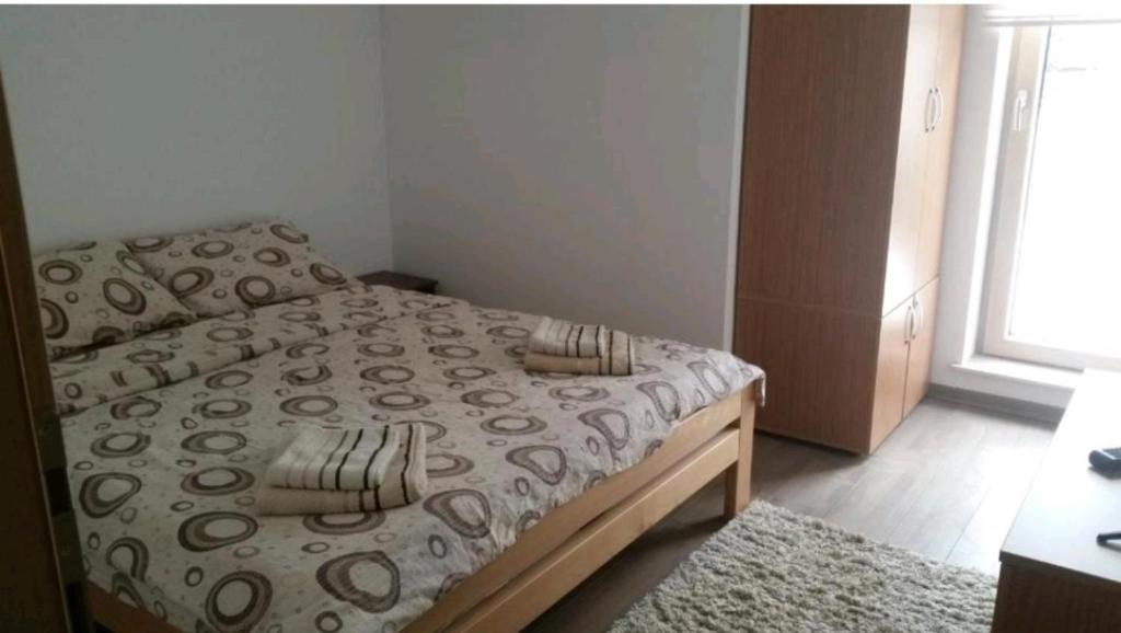Postel nebo postele na pokoji v ubytování M & M