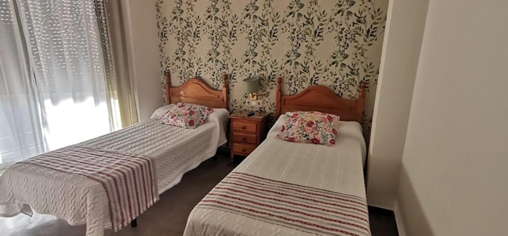 Postel nebo postele na pokoji v ubytování Hotel Corona de Atarfe