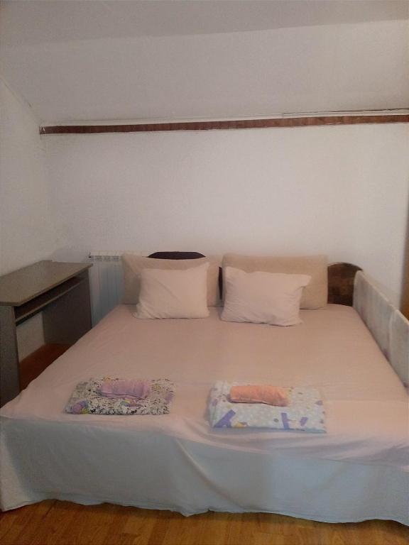 Postel nebo postele na pokoji v ubytování Vila Natalija