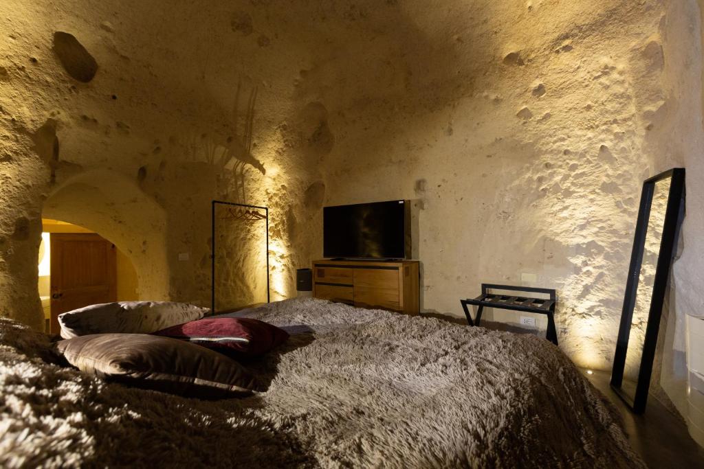 Telewizja i/lub zestaw kina domowego w obiekcie Grotta Barisano