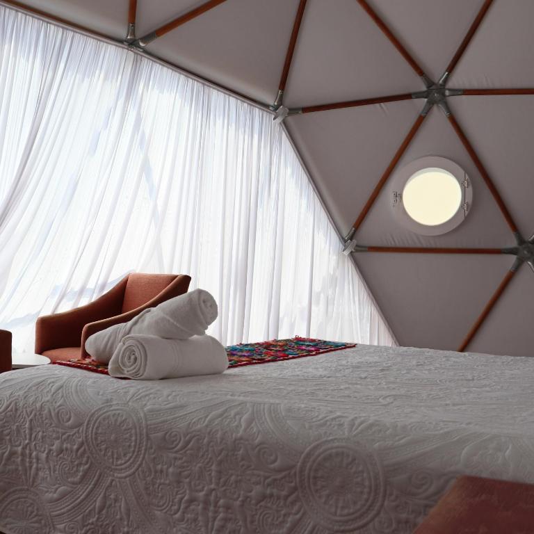 Postel nebo postele na pokoji v ubytování Cool Glamping Bernal