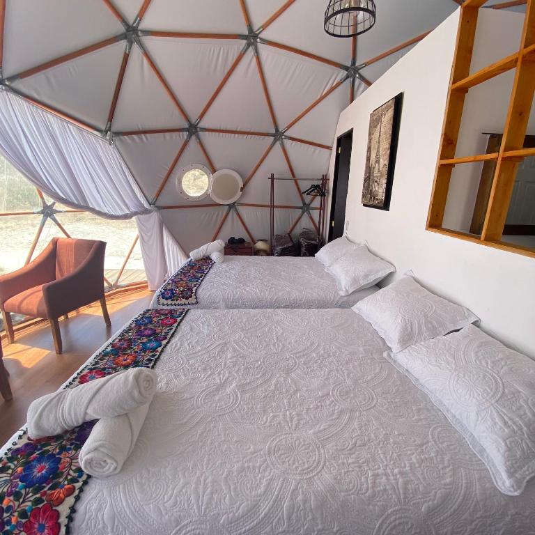 Postel nebo postele na pokoji v ubytování Cool Glamping Bernal