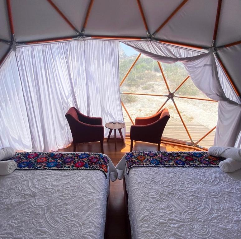 Postel nebo postele na pokoji v ubytování Cool Glamping Bernal