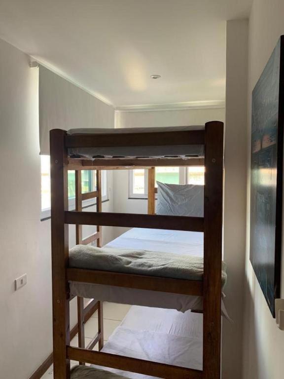 Postel nebo postele na pokoji v ubytování Laguna Hostel