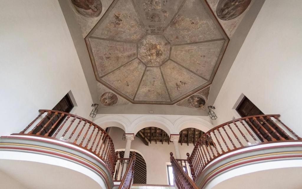 Łóżko lub łóżka w pokoju w obiekcie Apartamento Cabildo