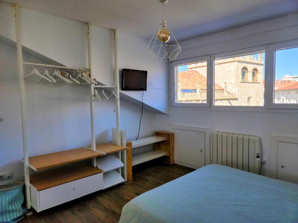 Postel nebo postele na pokoji v ubytování Mía Suites I Centro Histórico - PARKING & WIFI FREE