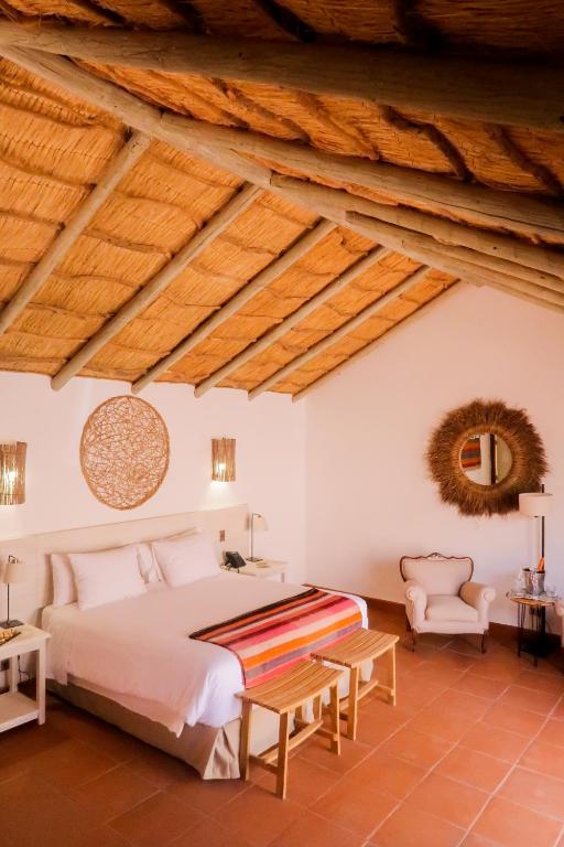 Postel nebo postele na pokoji v ubytování NOI Casa Atacama