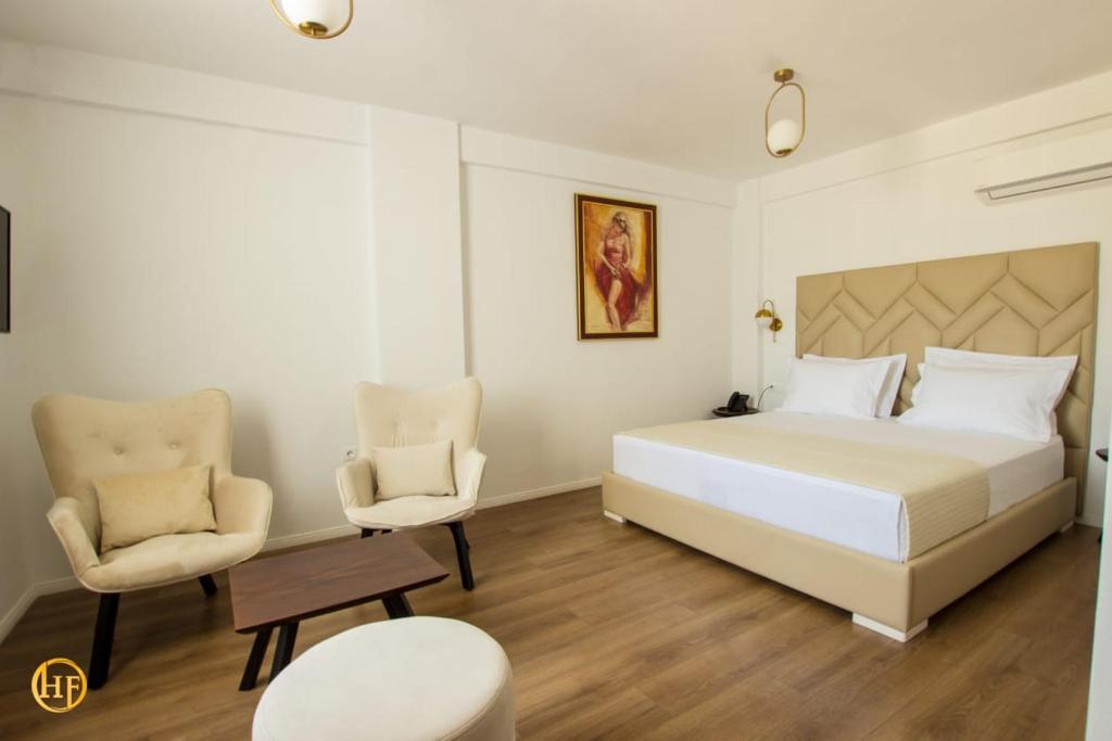 Postel nebo postele na pokoji v ubytování Hotel Fantasy