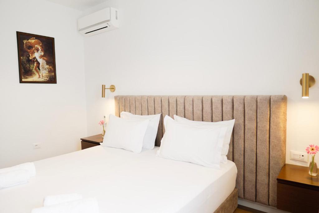 Postel nebo postele na pokoji v ubytování Hotel Fantasy
