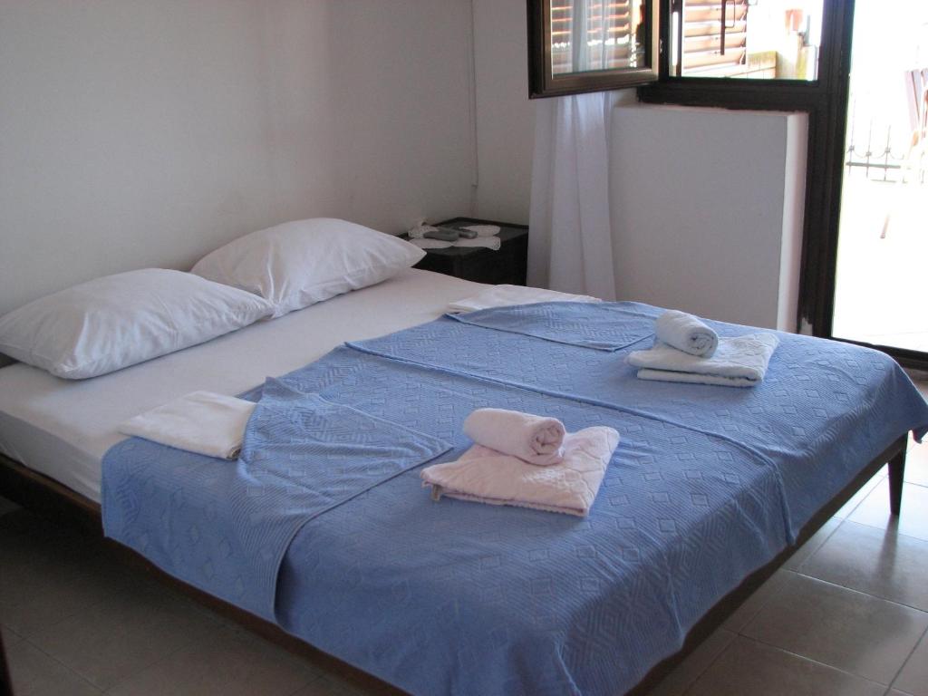 Postel nebo postele na pokoji v ubytování Guest House Ivo Jovanovic