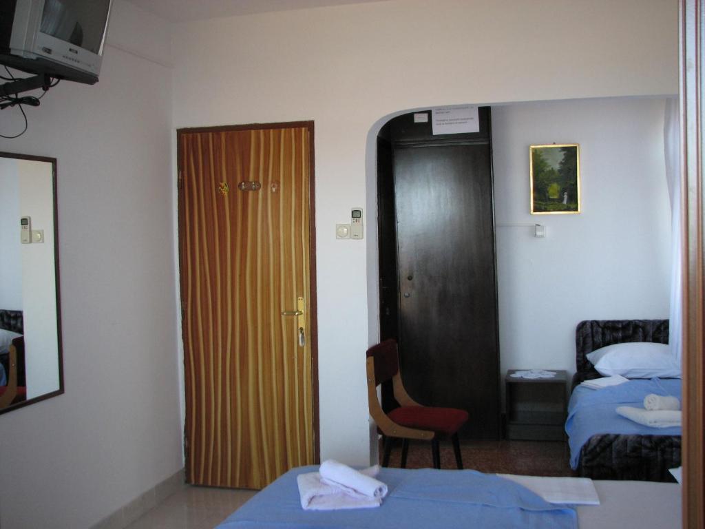 Postel nebo postele na pokoji v ubytování Guest House Ivo Jovanovic