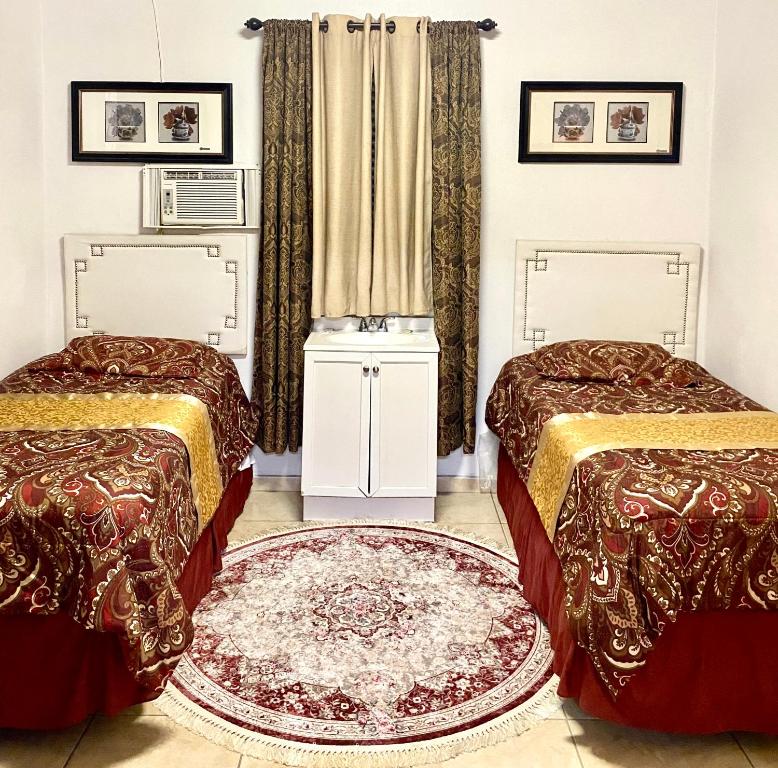 Katil atau katil-katil dalam bilik di Great Savannah Guesthouse