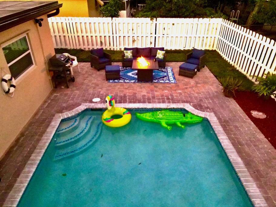 a swimming pool with a toy duck in the middle at Home in West Palm Beach with Heated Pool in West Palm Beach