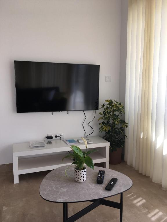 TV a/nebo společenská místnost v ubytování Casas nas Hortas