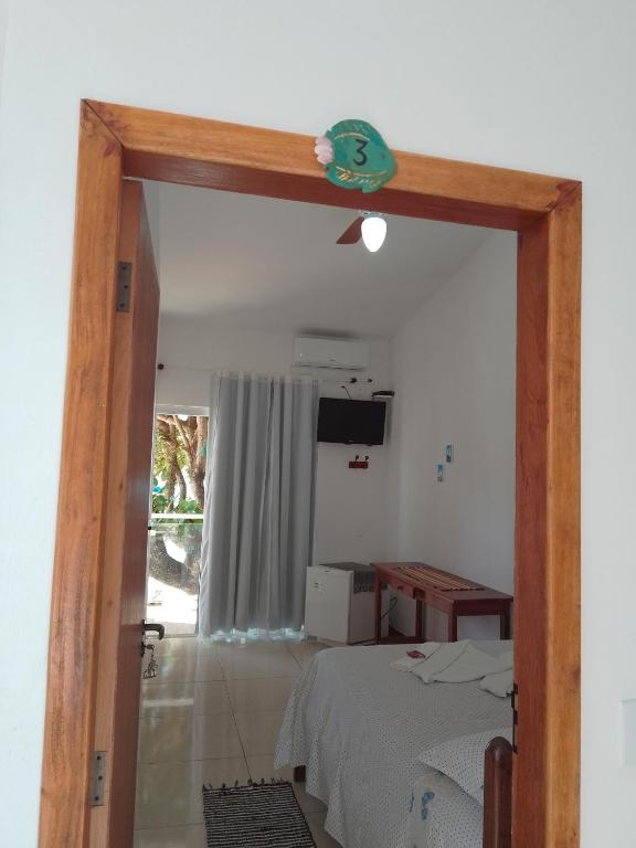 Postel nebo postele na pokoji v ubytování Pousada Pé na Areia