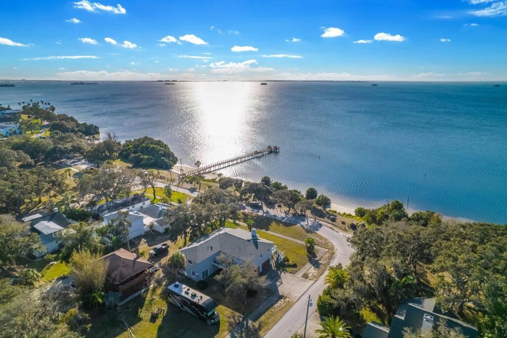 an aerial view of a house next to the water at Breathtaking Waterfront Crystal Beach Getaway! in Palm Harbor