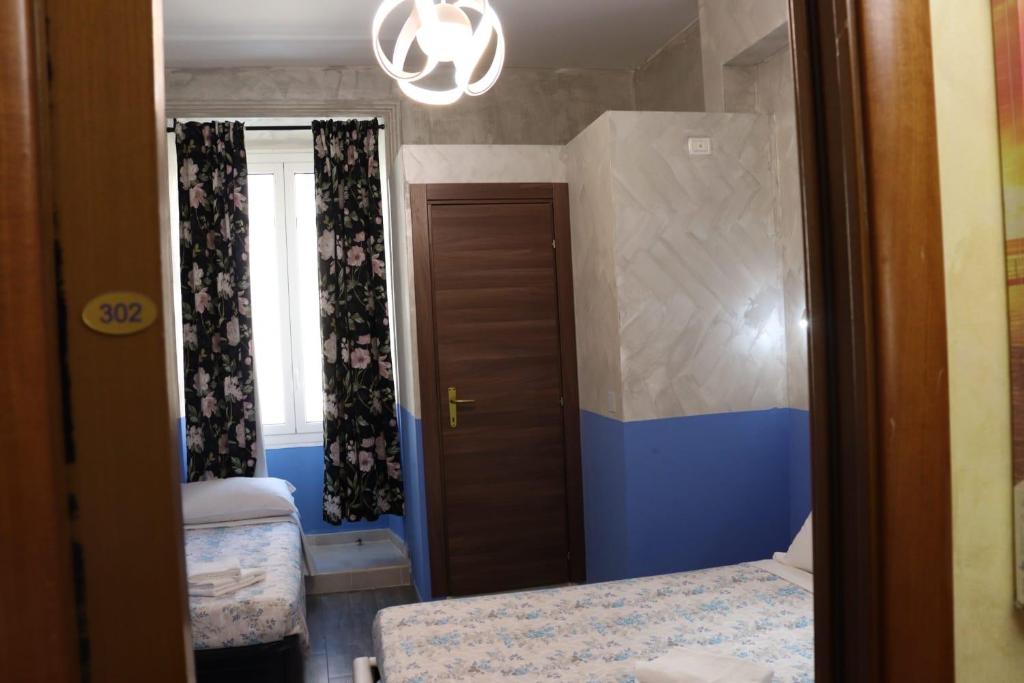 Posteľ alebo postele v izbe v ubytovaní Relaxon Guest House