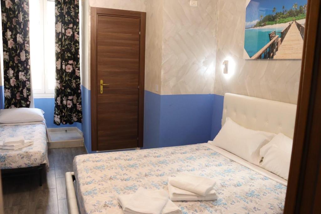 Posteľ alebo postele v izbe v ubytovaní Relaxon Guest House