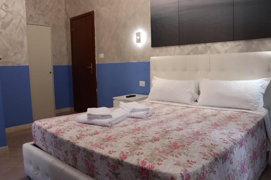 Posteľ alebo postele v izbe v ubytovaní Relaxon Guest House