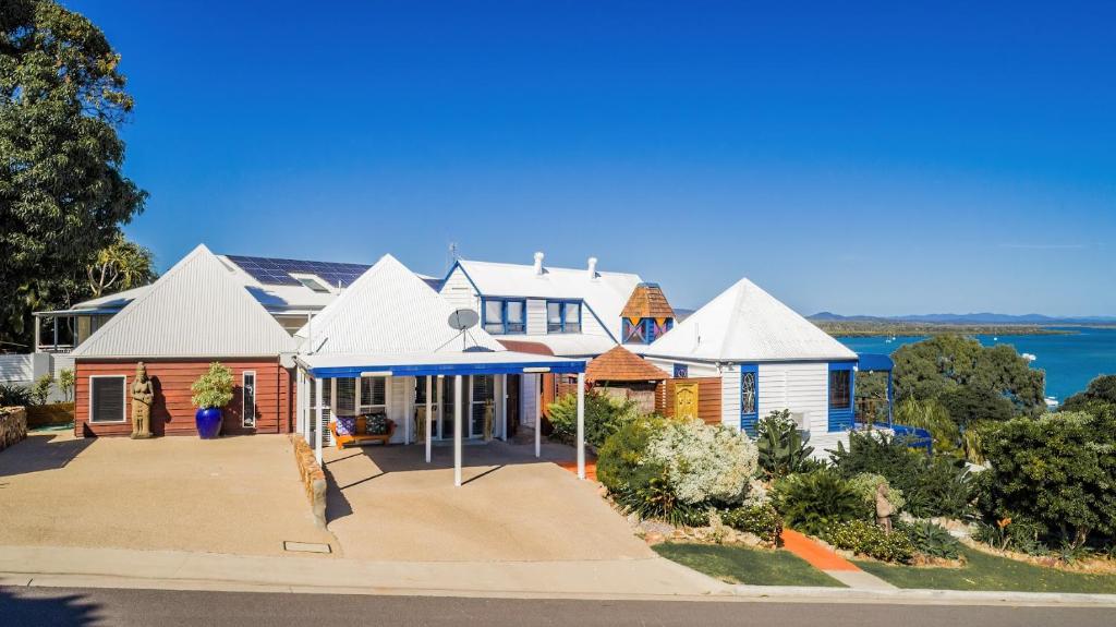 a house with a view of the water at 1770 Sovereign Lodge Retreat in Seventeen Seventy