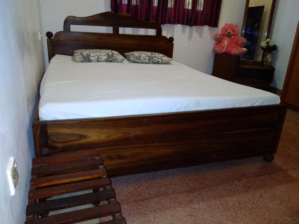 Postel nebo postele na pokoji v ubytování Holiday Home Anuradapura