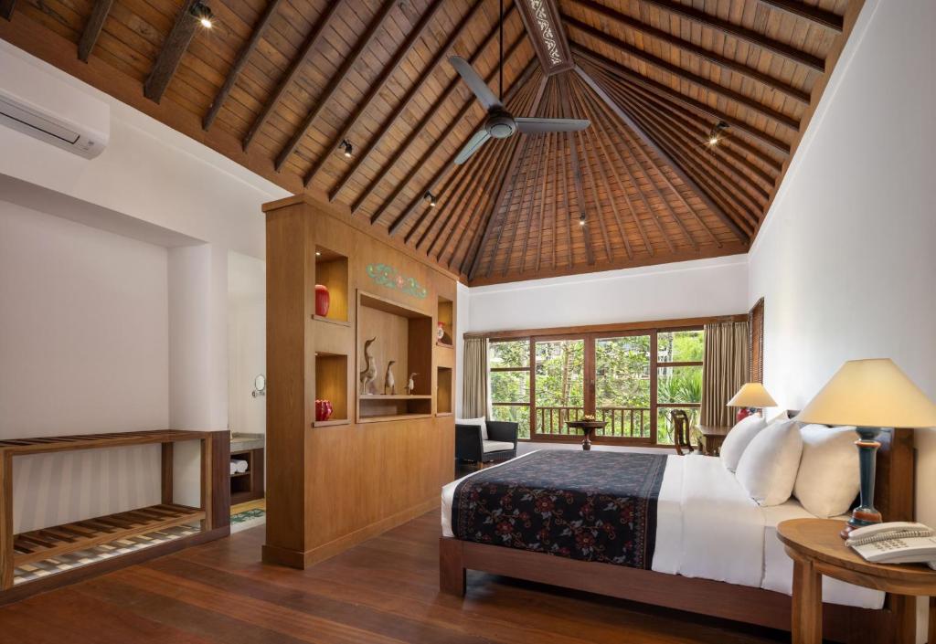 Postel nebo postele na pokoji v ubytování Korurua Dijiwa Ubud