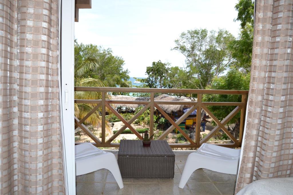 Balkón nebo terasa v ubytování Paradise Island Beach Resort