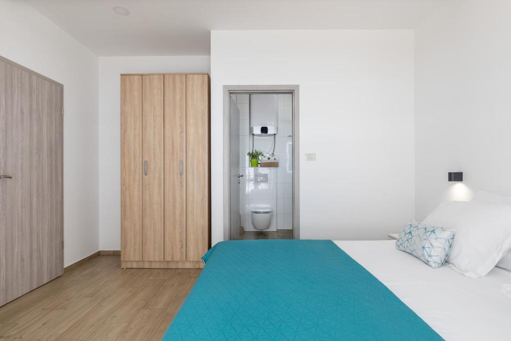 Postel nebo postele na pokoji v ubytování Luxurious apartments Bona fide