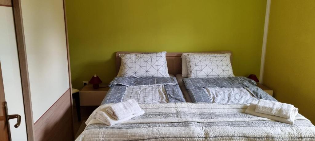 Postel nebo postele na pokoji v ubytování APARTMA ŽELE