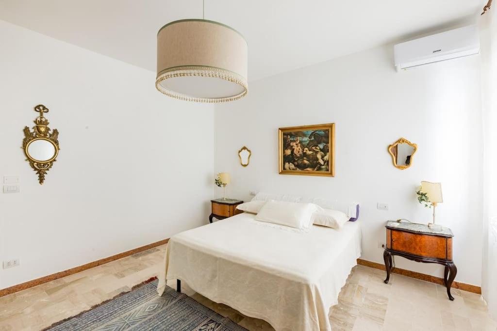 Postel nebo postele na pokoji v ubytování B&B Casa Sabella