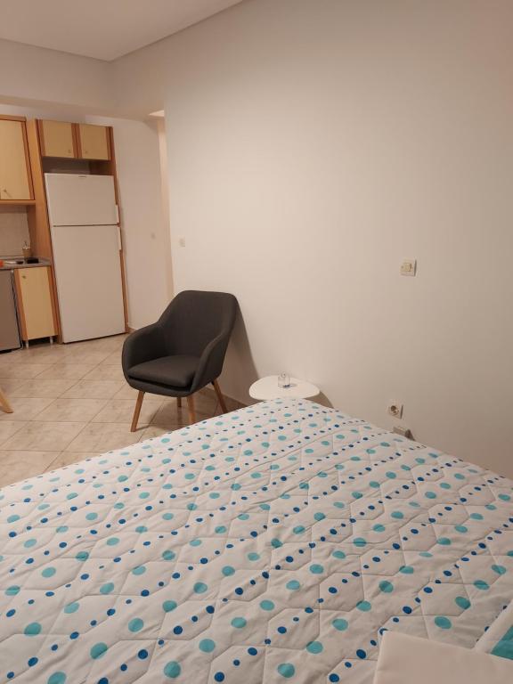 Posteľ alebo postele v izbe v ubytovaní ADLER 5 COZY ATHENS DOWNTOWN STUDIO
