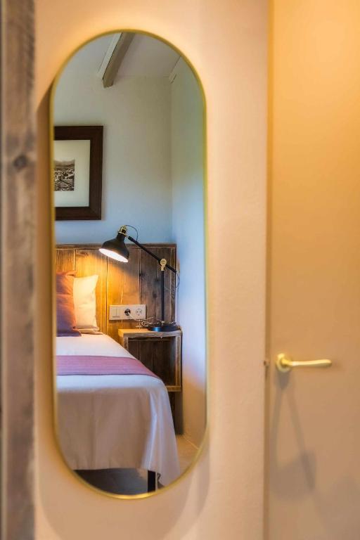 Posteľ alebo postele v izbe v ubytovaní El Molino de Besalú Casa con jardín