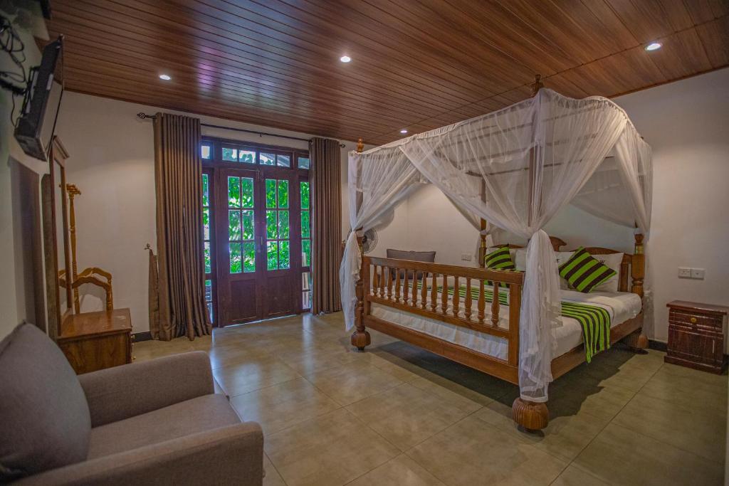 Postel nebo postele na pokoji v ubytování Avenra Cottage