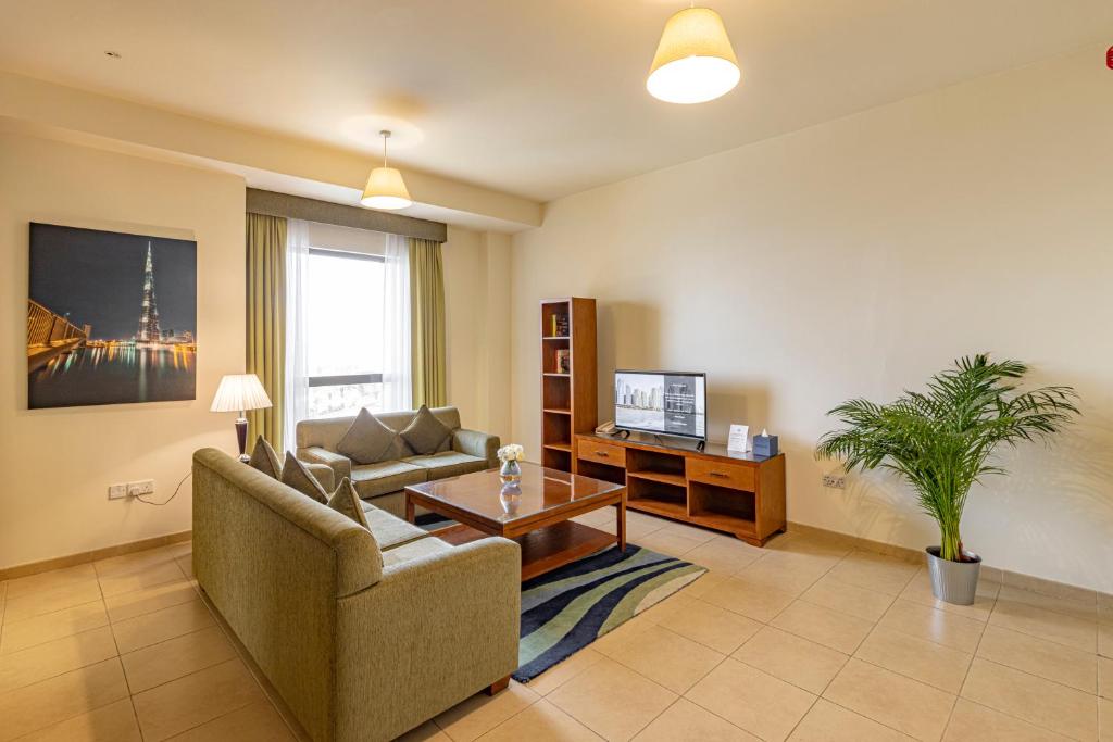 TV a/nebo společenská místnost v ubytování Roda Amwaj Suites Jumeirah Beach Residence