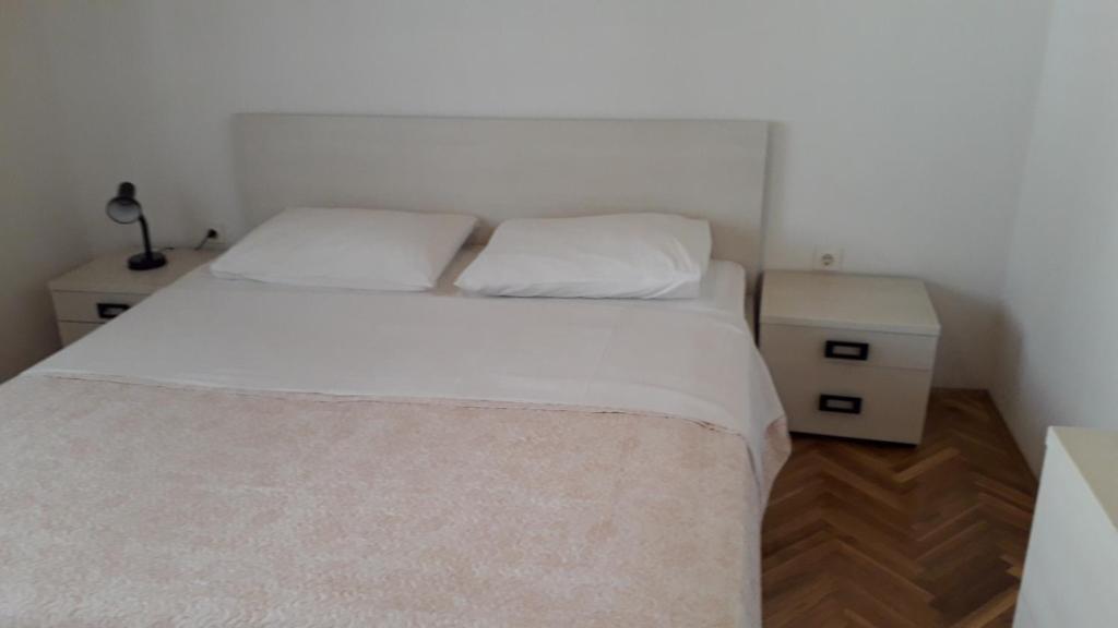 Apartments by the sea Stara Novalja, Pag - 6375 - Two-Bedroom Apartment With Terrace And Sea View