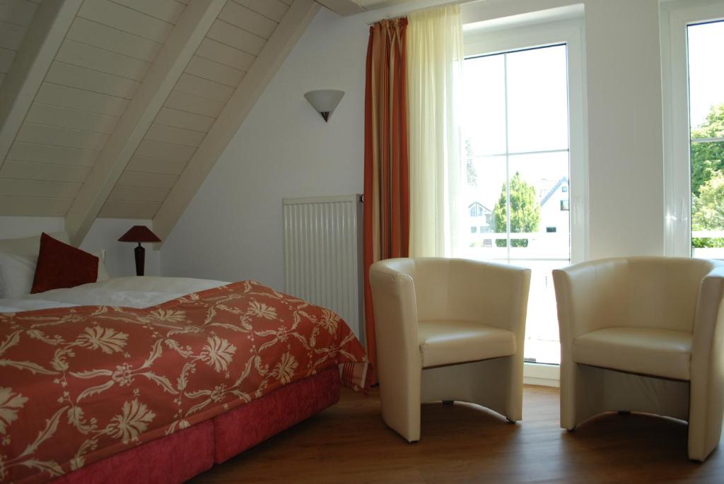 Postel nebo postele na pokoji v ubytování Im Winkel Appartements und Zimmer