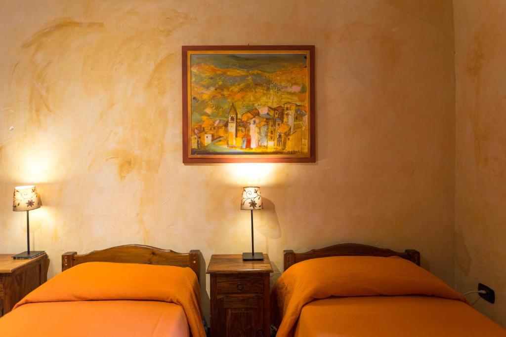 Posteľ alebo postele v izbe v ubytovaní Casetta la Crus - Romantic house