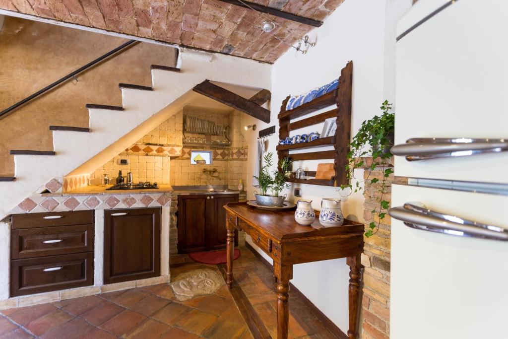 Kuchyňa alebo kuchynka v ubytovaní Casetta la Crus - Romantic house