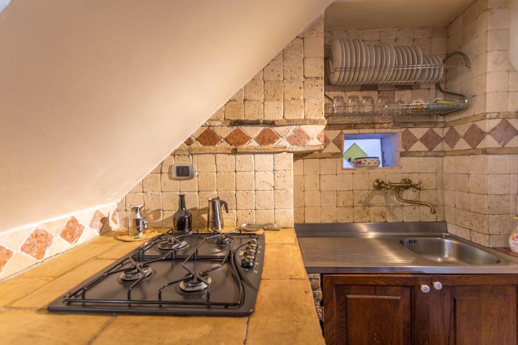 Kuchyňa alebo kuchynka v ubytovaní Casetta la Crus - Romantic house